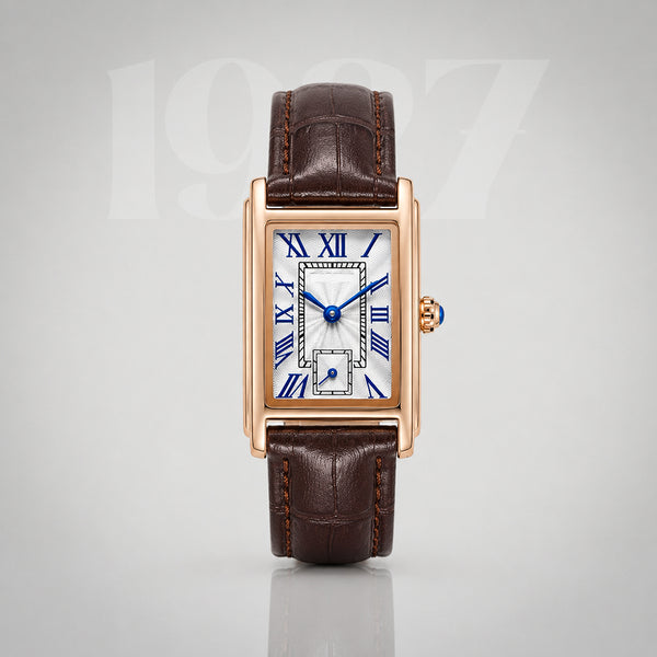 1927 gold Art Deco tank watch, silver guilloche dial with blue Roman numerals on brown crocodile strap
